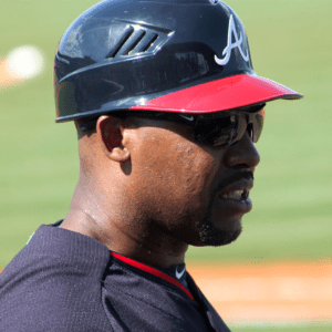 In 2008, it was made mandatory for on-field MLB coaches to wear helmets. Bo Porter, former coach for the Atlanta Braves, is photographed with an on-field helmet in 2015.